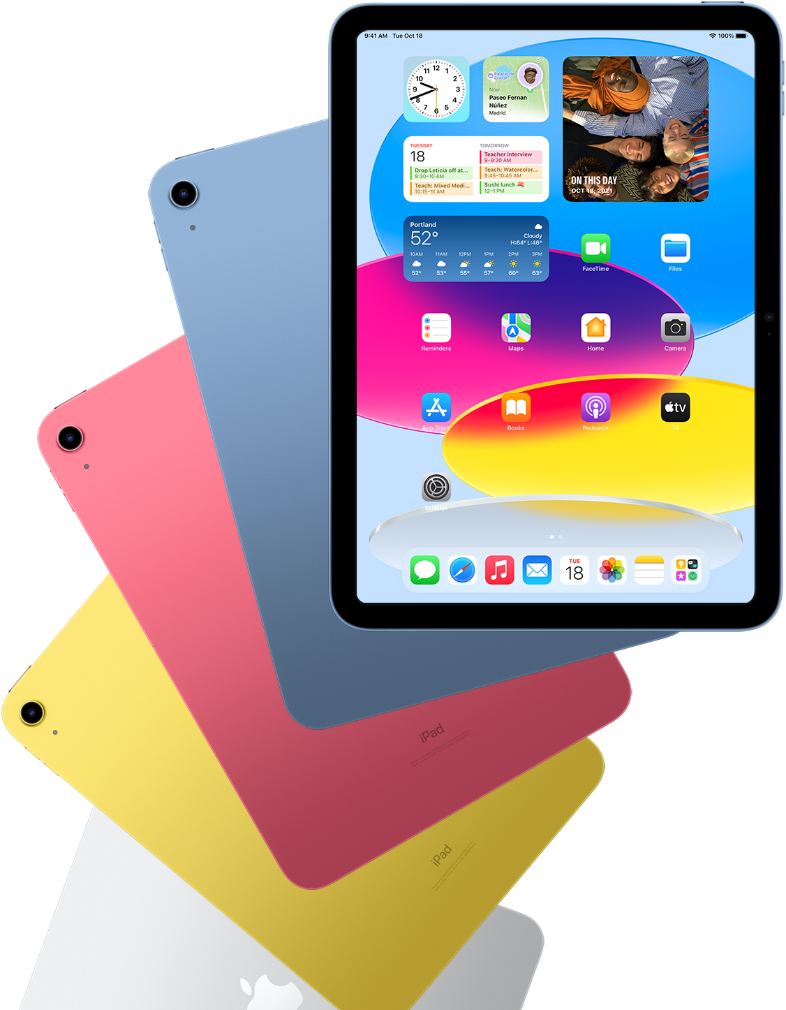 En iPad set forfra med synlig hjemmeskærm. Bag den ses fire iPad-bagsider i blå, lyserød, gul og sølv.