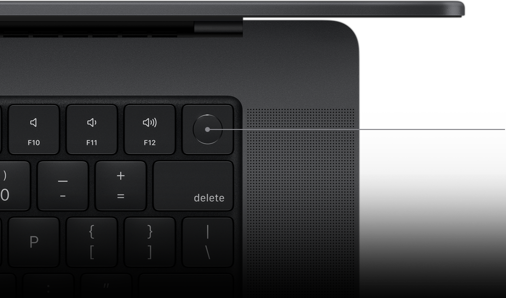Pil som pekar ut Touch ID-tangenten på Magic Keyboard.