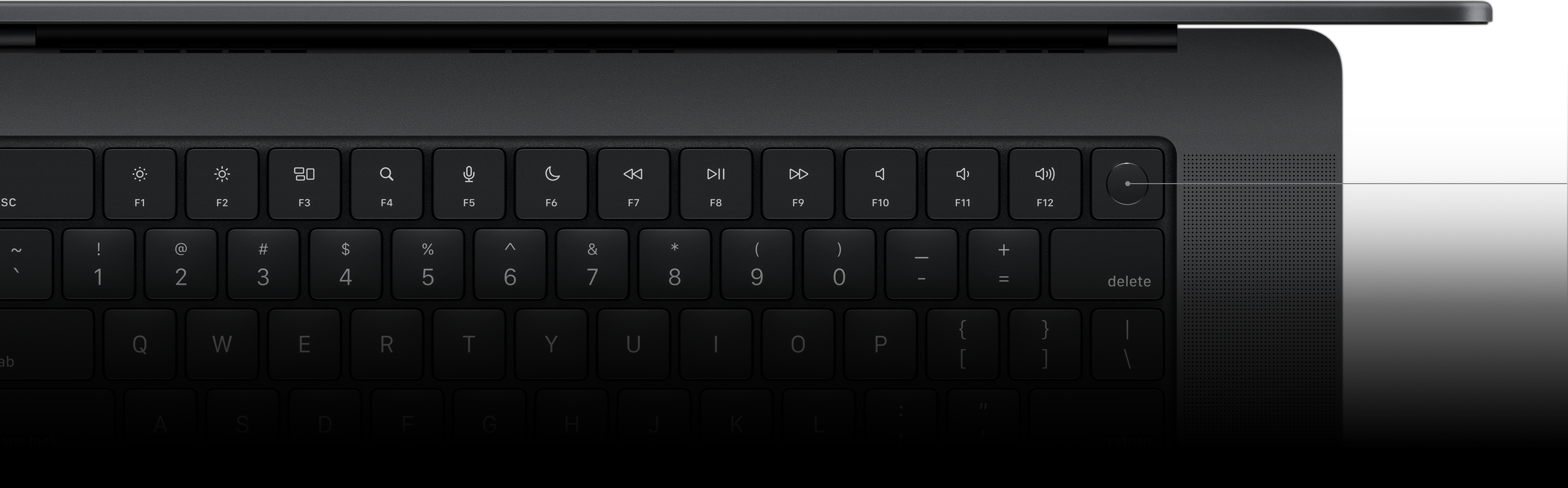 Pil, der viser Touch ID-tasten på Magic Keyboard.